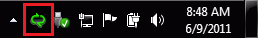 The notification area with the Lync/Communicator icon highlighted